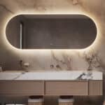 Deze grote, ovale design badkamerspiegel is van alle gemakken voorzien, zoals praktische verlichting, verwarming en een dubbele touch schakelaar met dimfunctie en instelbare lichtkleur